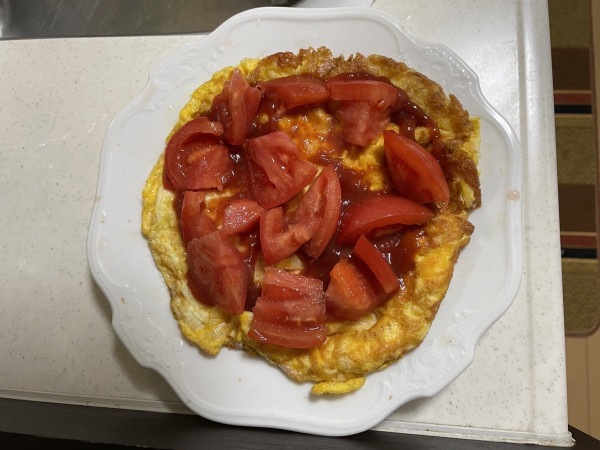 Cheese omelette with tomato slices and ketchup, made in Japan