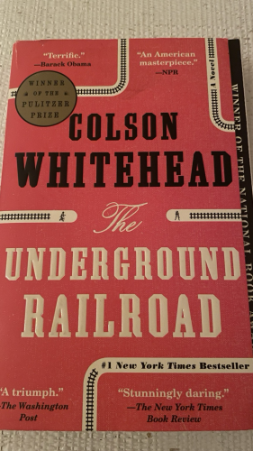 Image of red book cover, with some railroad tracks 