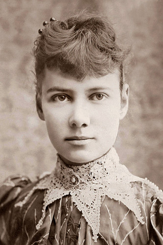 Black and white photo of Nellie Bly (Pseudonym of Elizabeth Cochrane Seaman), (1867-1922); head and shoulders; looking straight at the camera. By H. J. Myers, photographer - This image is available from the United States Library of Congress&#039;s Prints and Photographs divisionunder the digital ID cph.3b22819.This tag does not indicate the copyright status of the attached work. A normal copyright tag is still required. See Commons:Licensing for more information., Public Domain, https://commons.wikimedia.org/w/index.php?curid=478187