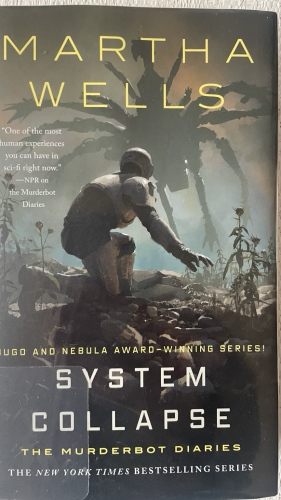 Book cover with a futuristic armored figure crouching