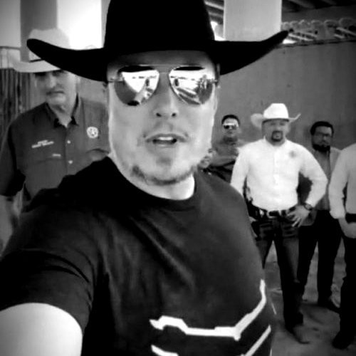 Elon Musk wearing a cowboy hat backwards at his livestream event.