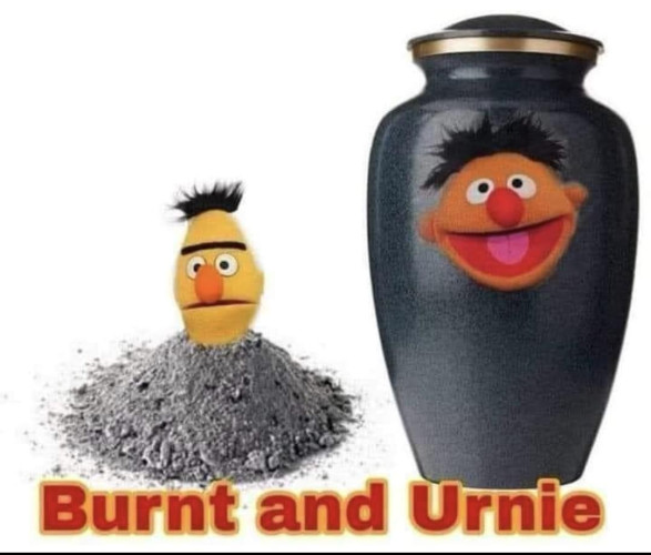 A Picture of Bert's head (from Sesame Street) atop a pile of ashes with a picture of an urn with Ernie's face on it

The text says "Burnt and Urnie"