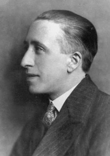 A black-and-white photograph in profile of James Leslie Mitchell, also known as Lewis Grassic Gibbon